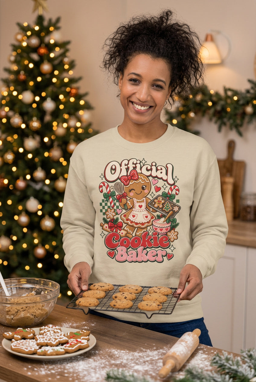A woman wearing a cream-colored crewneck sweatshirt with a graphic print that reads 'My Protection Body and Soul' around an illustration of an open book with a small figure inside. She is posing against a two-tone gray and peach background.